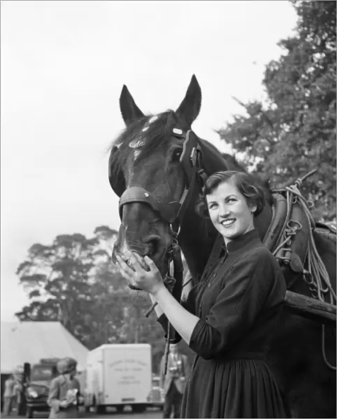 Audrey Walters, Miss Young Farmer with her horse. October 1952 C4936