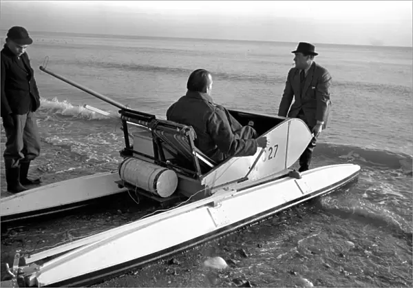 Mr. Du - Preaine setting out on crop channel trip in pedal boat. January 1953 D437-003