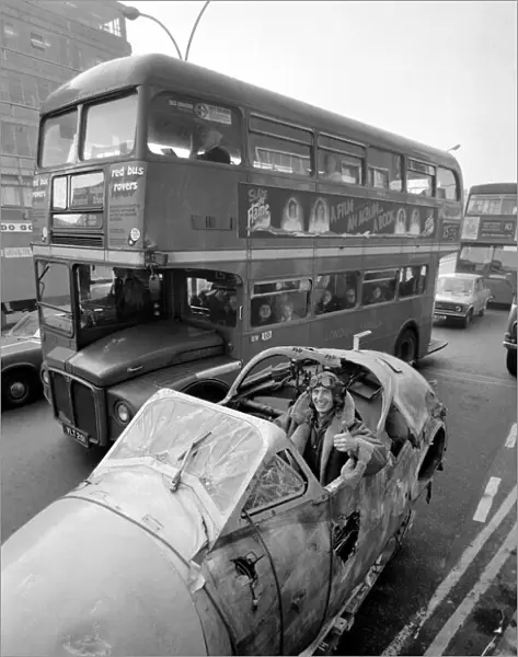 Aircraft arrives in Whitechapel High Street for art show. February 1975 75-01071