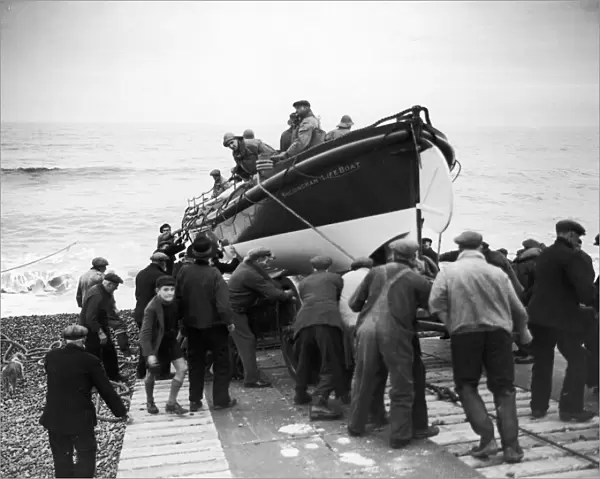 Sheringham lifeboat being launched into the water in Norfolk. Circa 1935