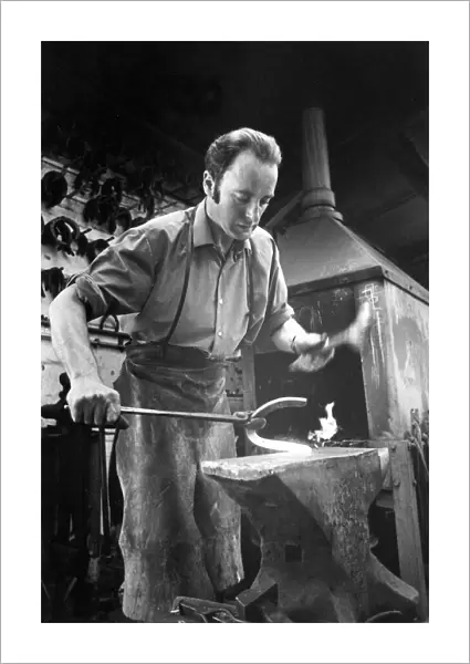Blacksmith Joe Baty, of Hexham making horseshoes