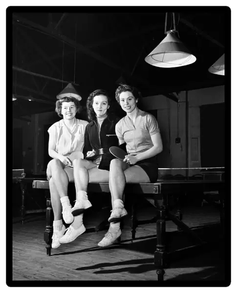 Mrs. Joan Riddick (L). Table Tennis Contest. August 1953 D461-003