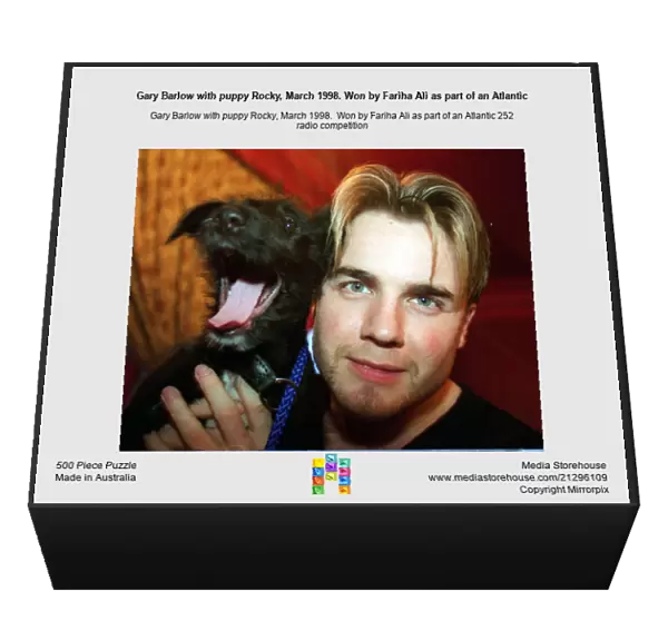 Gary Barlow with puppy Rocky, March 1998. Won by Fariha Ali as part of an Atlantic