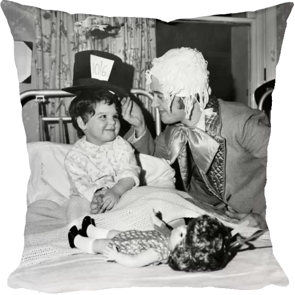 Children of Booth Hall Hospital meet character from Alice in Wonderland
