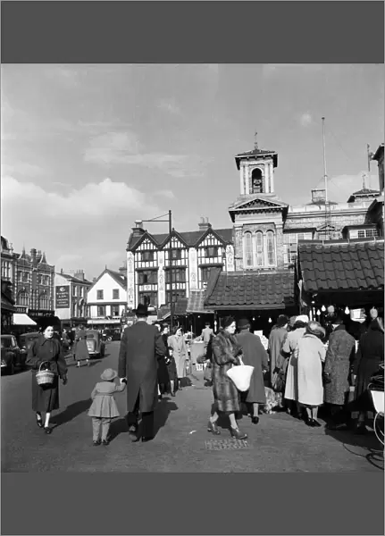 Street scene in Kingston Upon Thames in south west London. January 1952 D784