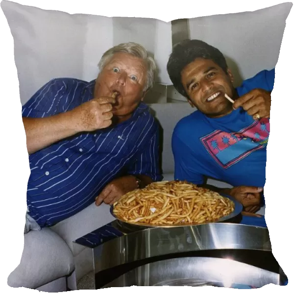 Benny Hill Actor Comedian With Fellow Actor Erik Estrada Eating A Plate Of Chips