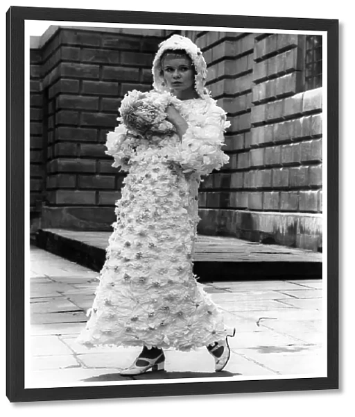 Fashion 1960s: Getting into the paper when you Marry. Wedding gowns are usually kept top
