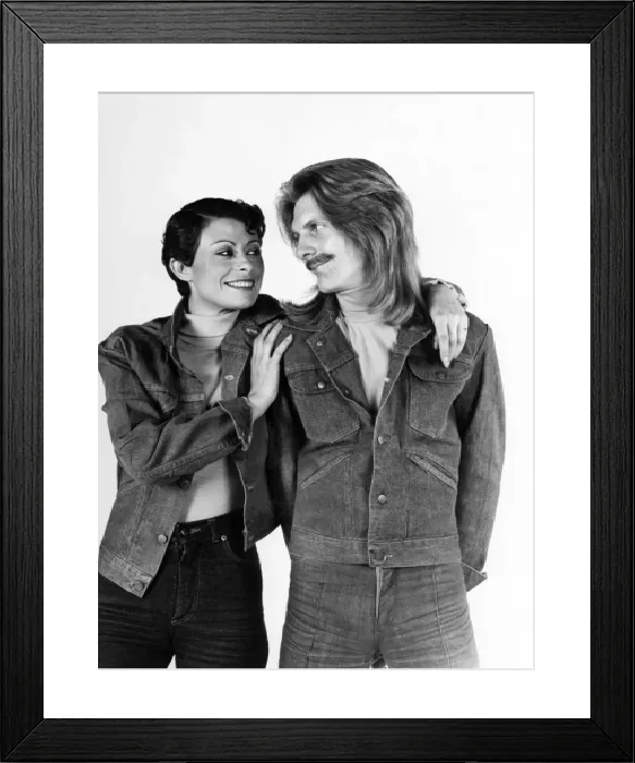 Framed Print : Fashion Print: Couple in Denim Outfits, March 1976