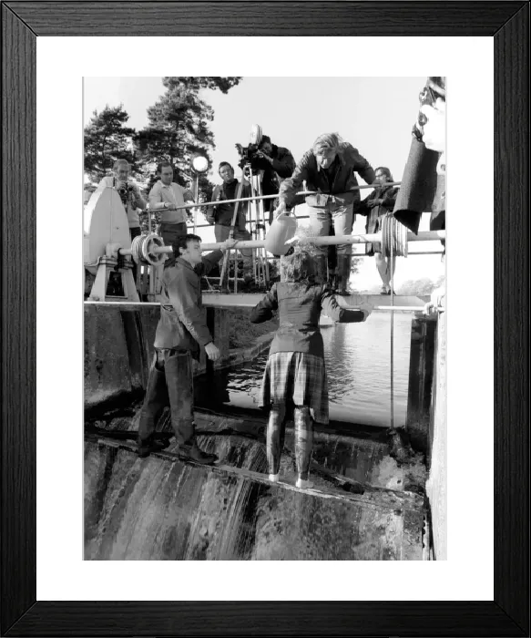 Framed Print : Black and white print of a television actress in a wet scene