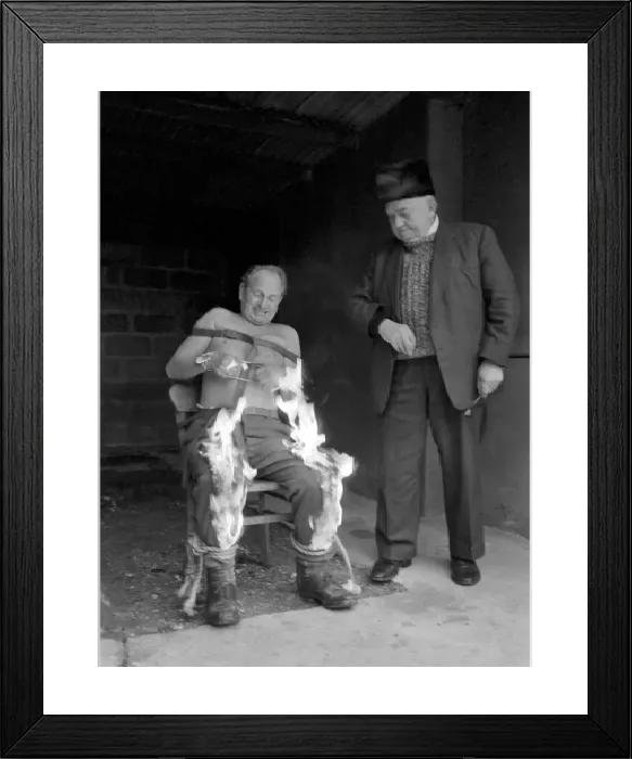 Framed Print : Print of a man setting fire to his trousers Framed Print : Print of a man setting fire to his trousers