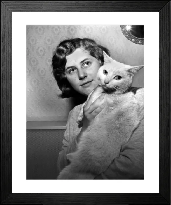 Framed Print : People with Animals Print: Woman Holding Cat, November 1969