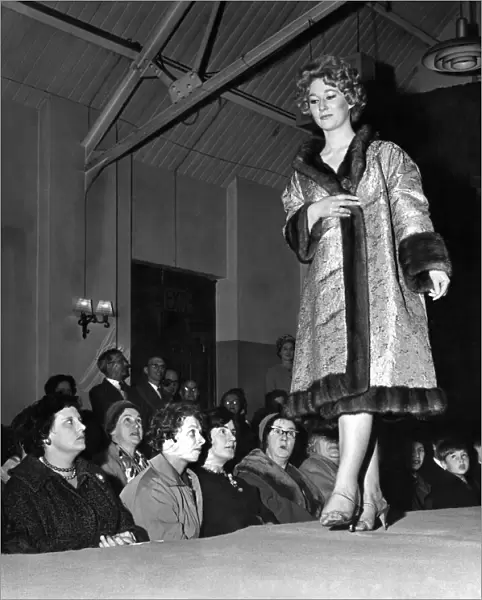 Janet Thompson in a brocade-lined wild mink, worn inside out displays the coat