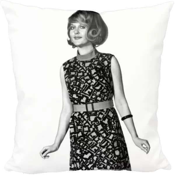 Reveille Fashions: Delia Freeman wearing a summer sleeveless dress. June 1969 P008472