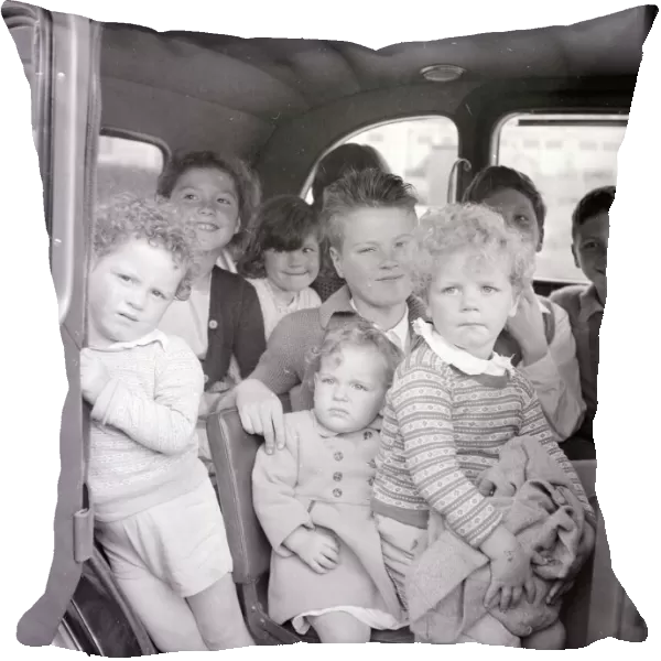 Mrs Mavis Graham and her 12 children seen here arriving at Bigbury on Sea in Devon