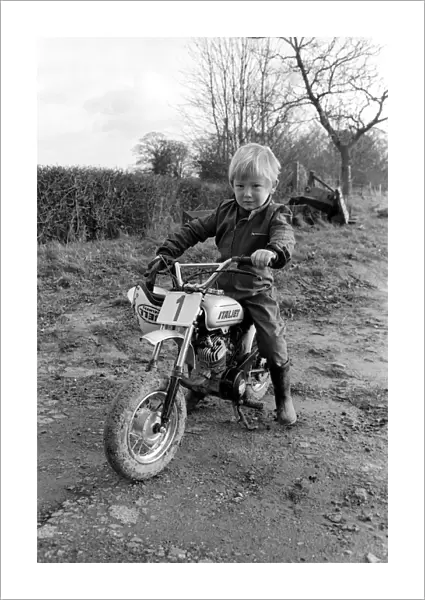 4 years old Jan Dixon on his mino motor bike. December 1974 74-7664-002