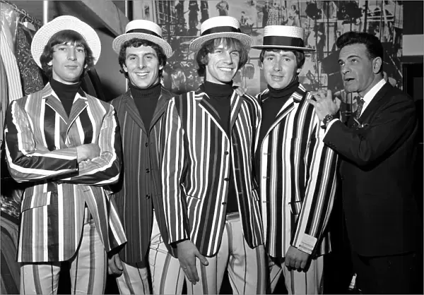 Ronnie Bond, Peter Staples, Chris Britton and Reg Presley of the pop group The Troggs