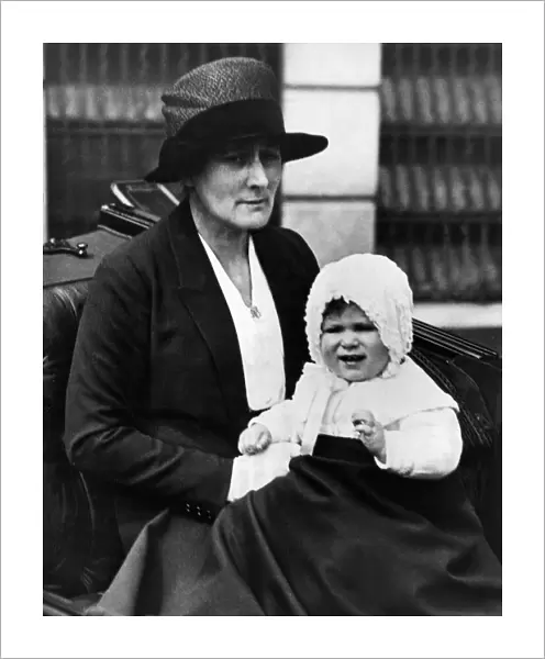 Queen Elizabeth II - Princess Elizabeth as a baby, leaves Buckingham Palace in an open
