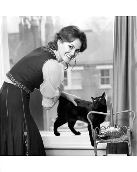 Healers Feature: Anna MaCloud: Woman with cat. February 1975 75-00711-004