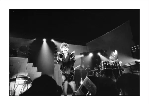 British pop group The Thompson Twins performing on stage during a concert in Oxford