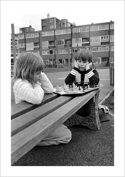 East End Kids Chess Congress: Practising in the playground in Stepney L  /  R 7-year-old