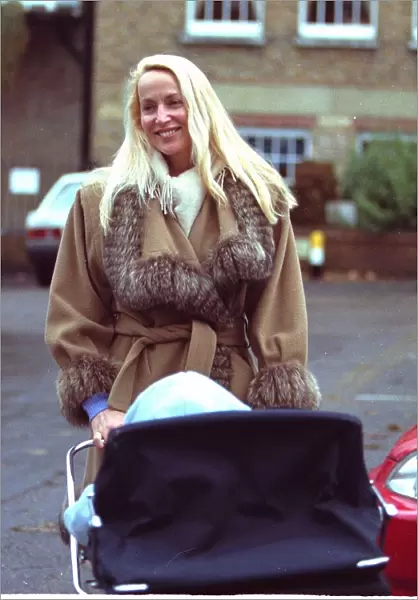 Model Jerry Hall leaves home today with baby son Gabriel in the pram