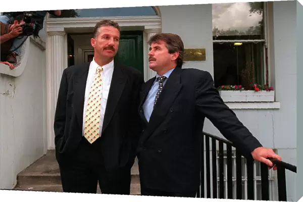 A dejected Ian Botham and Allan Lamb after losing their libel case against Imran Khan