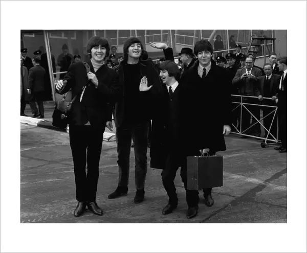 The Beatles leave London Airport bound for the Bahamas to commence filming on their