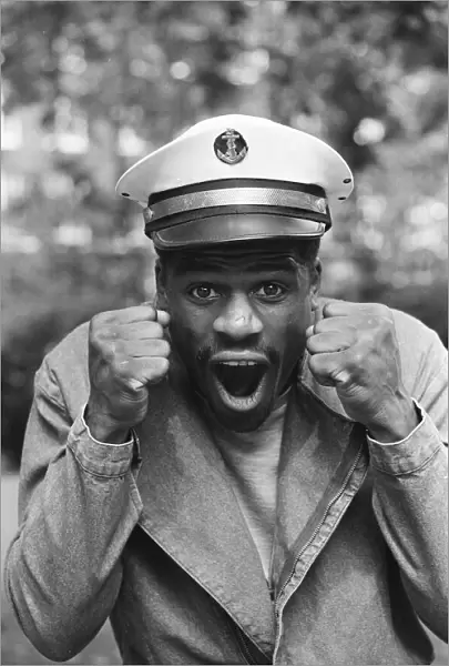 Boxer Errol Christie wearing a sailors hat. 28th August 1986