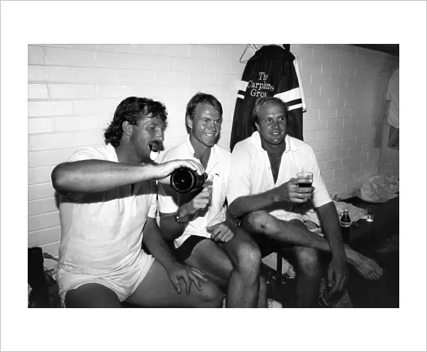 England all rounder Ian Botham celebrates in the dressing room with teammates in