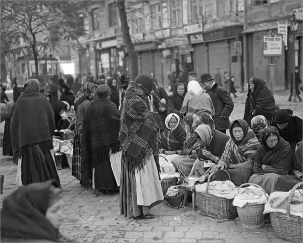 Peasant women in the market place in Lemberg selling their wares. Circa October 1914