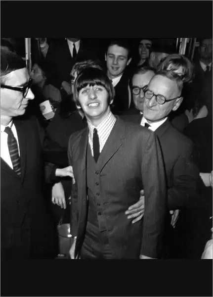 Beatle drummer Ringo Starr today leaving University College Hospital, Gower St