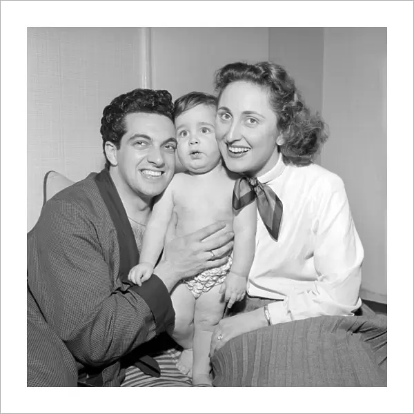 Singer Frankie Vaughan seen here with his wife and son David. Circa 1957