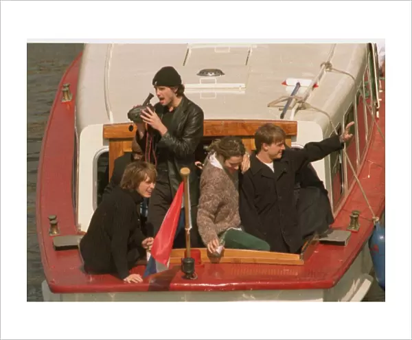 Take That in the Netherlands after their final concert, leaving on a canal tazi as fans