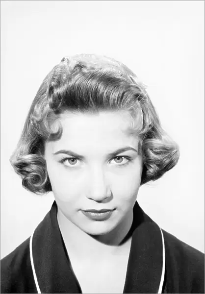 Fashion: Hairstyle 1957. May 1957