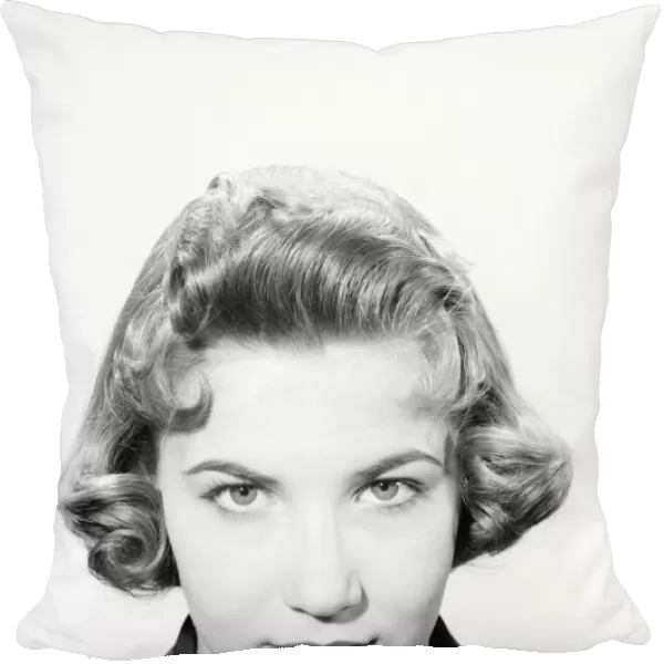 Fashion: Hairstyle 1957. May 1957