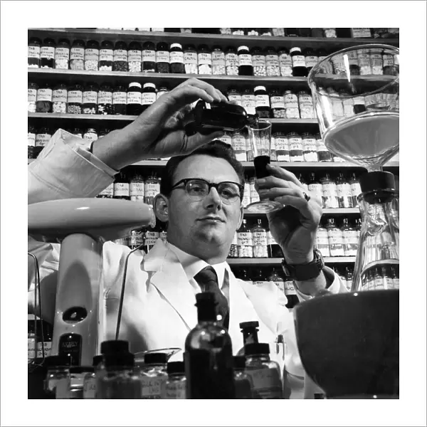 Roger Knowles chemist finds a new perfume. November 1964