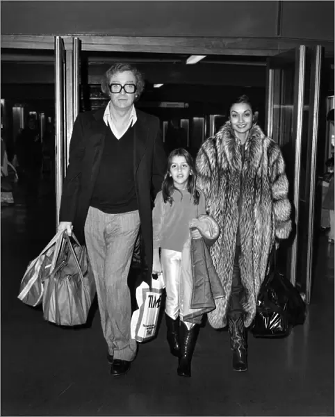 Entertainment: Film Actor: Michael Caine and wife Shakira and daughter Natasha (7