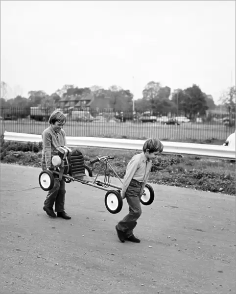 ChildrenIs Go-kart: Robert and Richard Spicer carry the Go Kart on to the Skid Pan