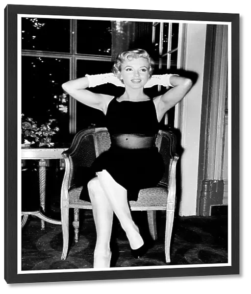 Marilyn Monroe July 1956 Actress Pictured sitting on a chair in hotel foyer for