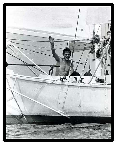 Robin Knox Johnston waves to his parents from his Suhaili boat at Falmouth before his