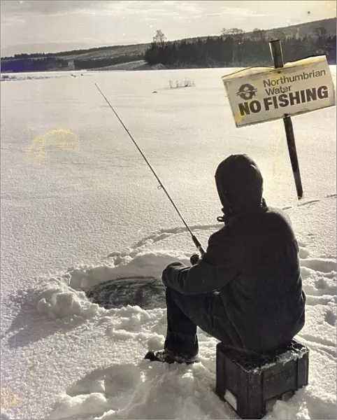 Eskimo style fishing in this winter wonderland at Kielder when the lake froze over in