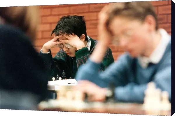 Children playing in a chess compeition in 1996