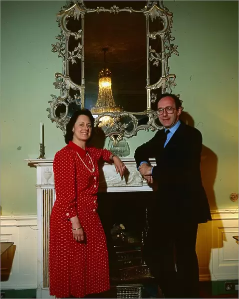 Malcolm Rifkind politician August 1989 with wife Edith standing in front of a mirror at