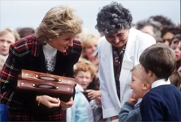 Princess Diana with children from Malcolm Sargent home during a visit to Prestwick