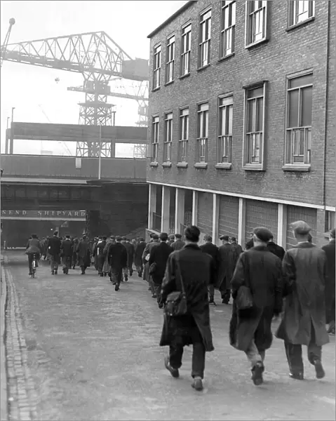 Their strike over, shipyard men return to work at Wallsend Shipyard in 1957