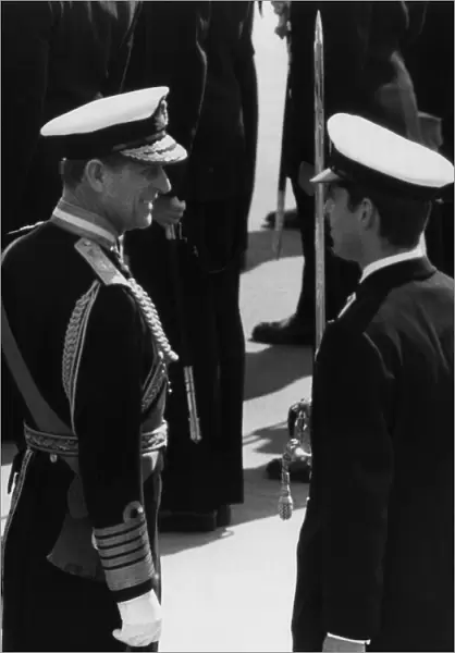 Prince Philip, Duke of Edinburgh talks to his son Prince Andrew during the Queen