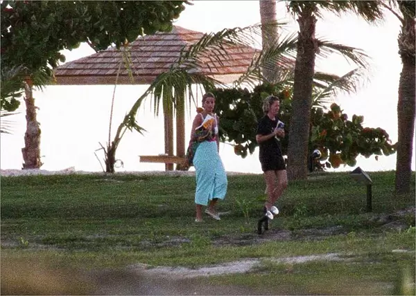 Diana, Princess of Wales, walks back to her chalet with her friend Victoria Mendham