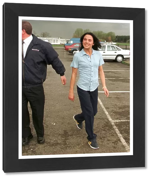 Mel C Sporty Spice April 1998 walks across the car park as she prepares to leave