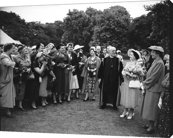 The Queen Mother in the gardens of Lambeth Palace 1955 with the Archbishop of
