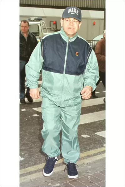Sir Elton John leaving Heathrow on his way March 1998 to Australia